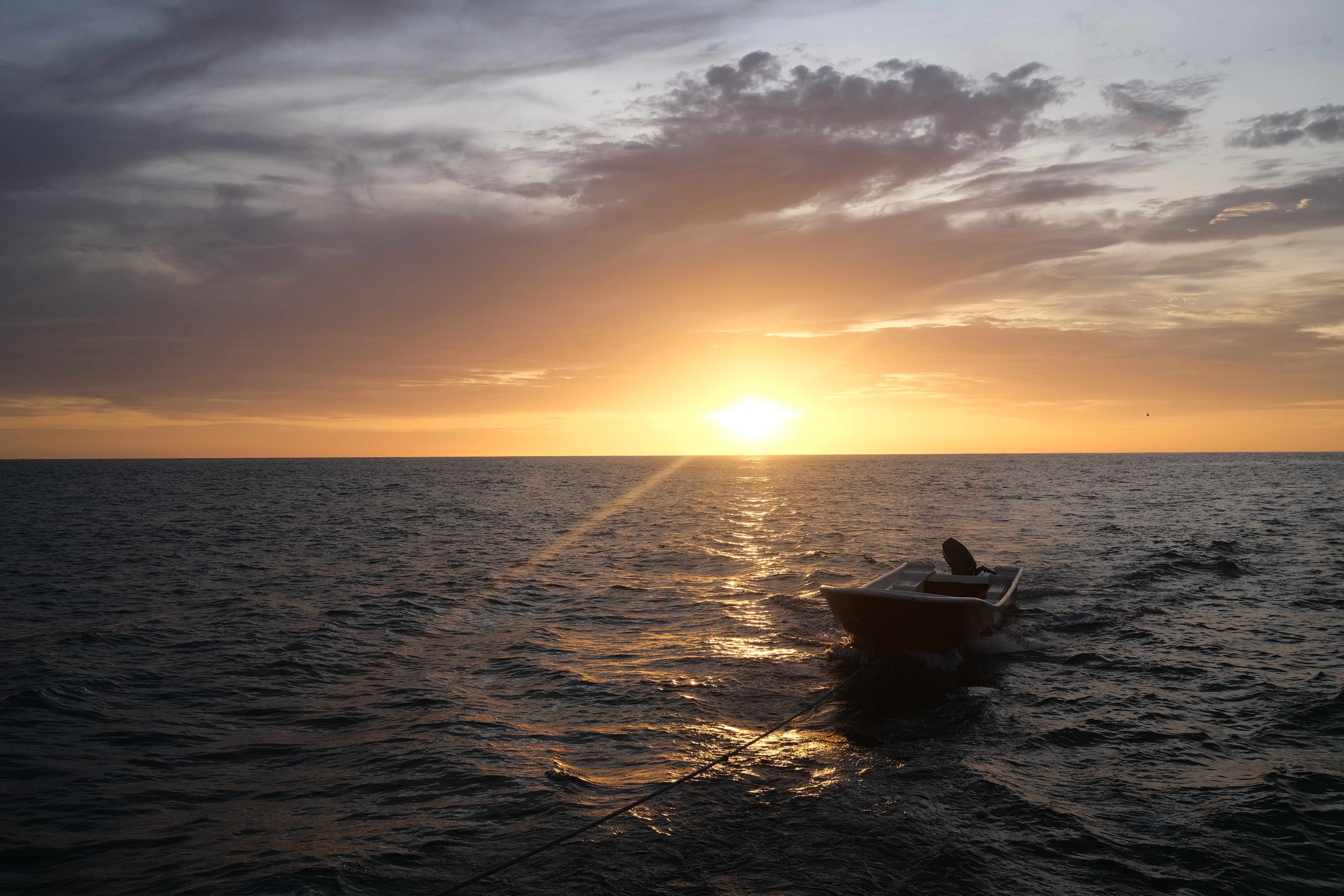 sunset_over_small_boat